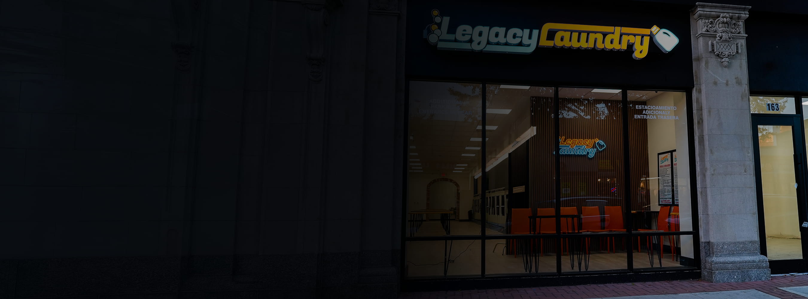 Wide interior view of Legacy Laundry – clean, bright, modern laundromat in Plainfield, NJ